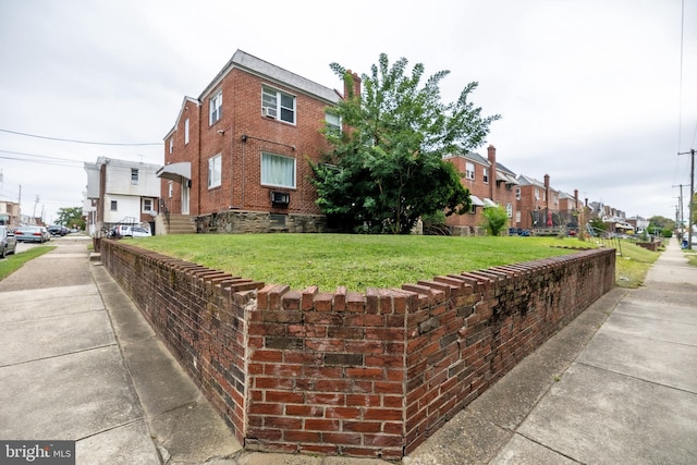 exterior space featuring a residential view and entry steps