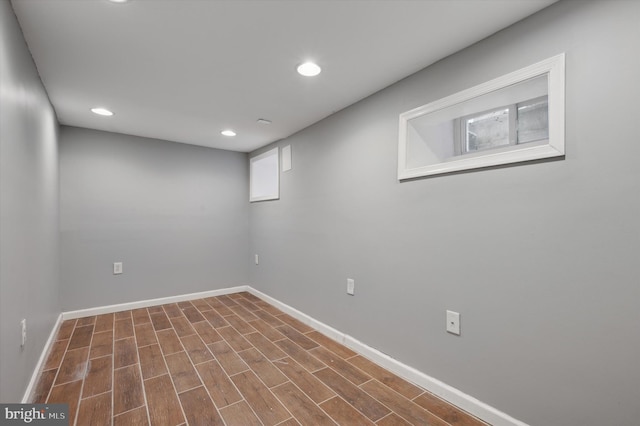 basement featuring dark wood-type flooring