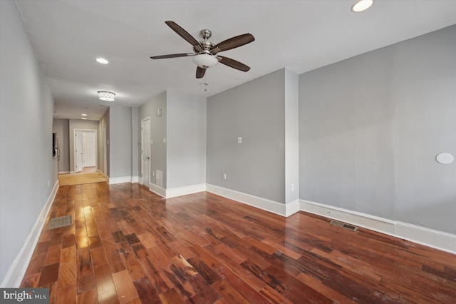 empty room featuring hardwood / wood-style flooring and ceiling fan