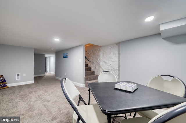 view of carpeted dining space