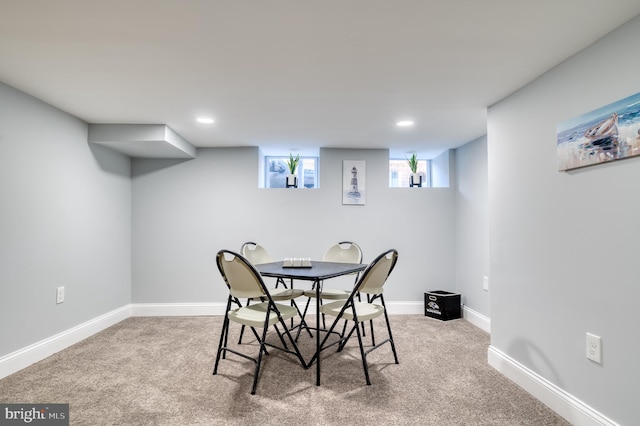 view of carpeted dining area