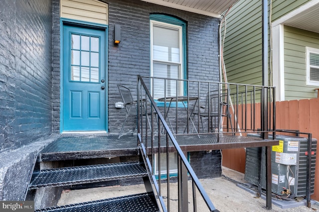 entrance to property with central AC unit