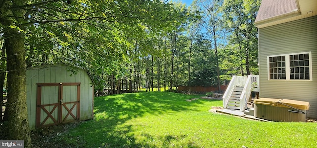 view of yard with a storage unit