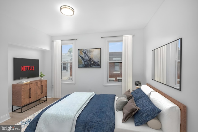 bedroom with light hardwood / wood-style flooring