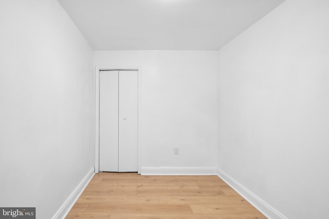 unfurnished room featuring light hardwood / wood-style flooring