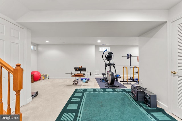 exercise room with carpet flooring