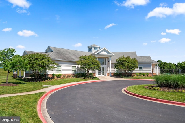 view of front of house with a front lawn