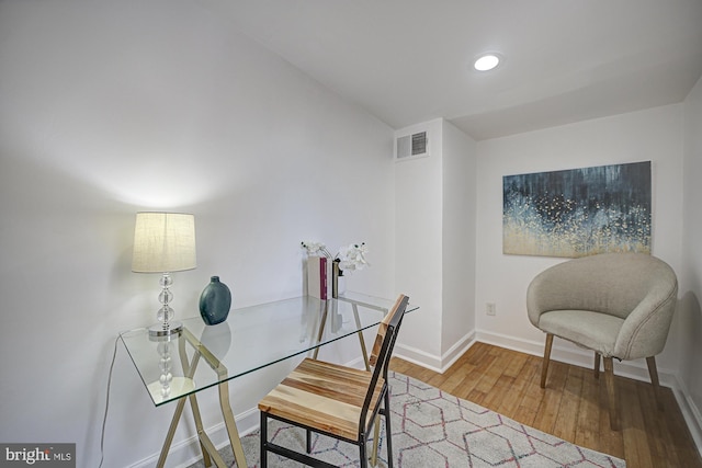 office featuring hardwood / wood-style floors