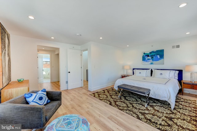 bedroom featuring light hardwood / wood-style floors