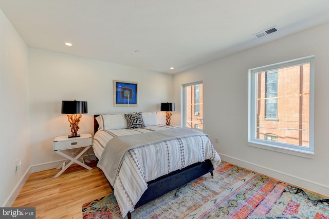 bedroom featuring light wood-type flooring