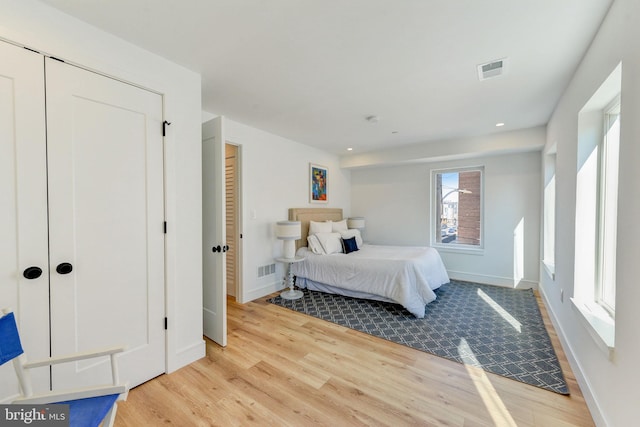 bedroom featuring light hardwood / wood-style floors