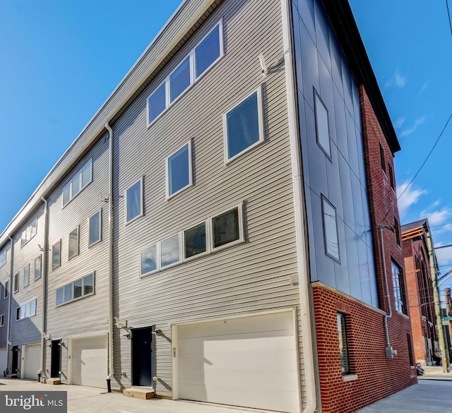 exterior space with a garage