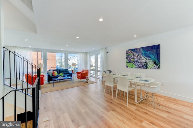 dining room with light hardwood / wood-style floors