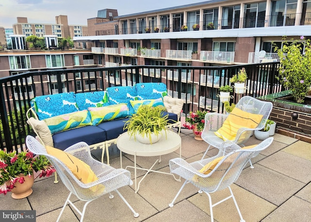 balcony featuring an outdoor living space