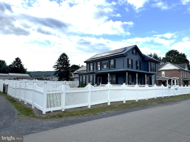 farmhouse featuring a porch