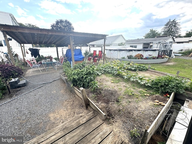 view of yard featuring a pergola and a patio