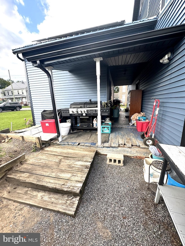 view of patio featuring a deck