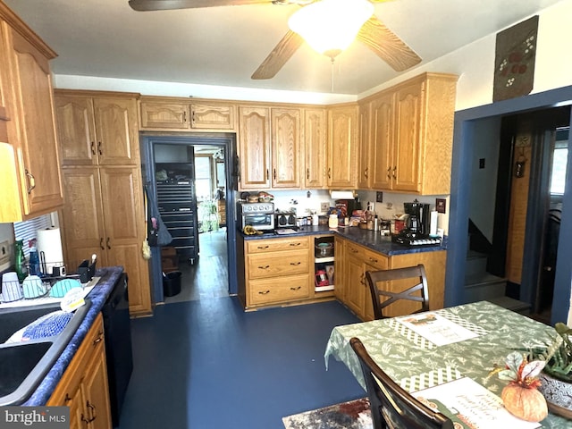 kitchen featuring ceiling fan and sink