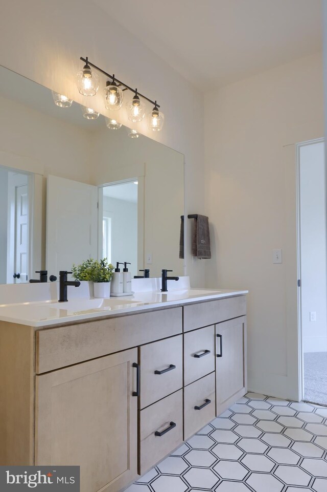 bathroom featuring hardwood / wood-style flooring and vanity