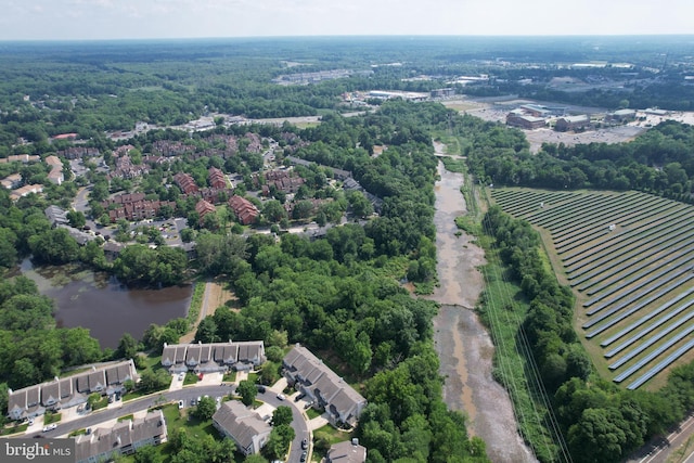 drone / aerial view with a water view and a rural view