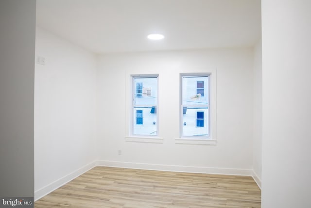 unfurnished room featuring light hardwood / wood-style flooring