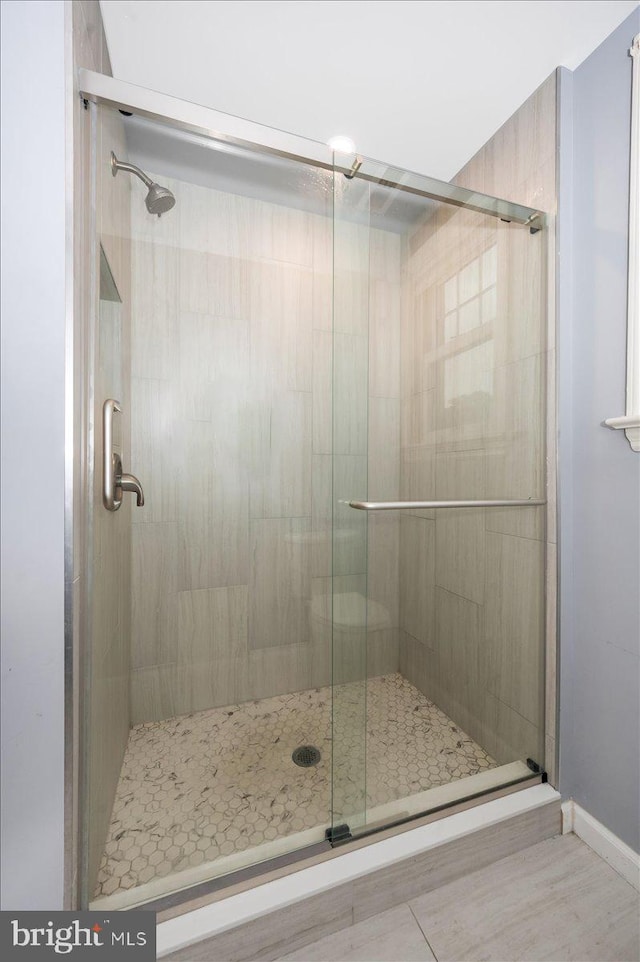 bathroom featuring walk in shower