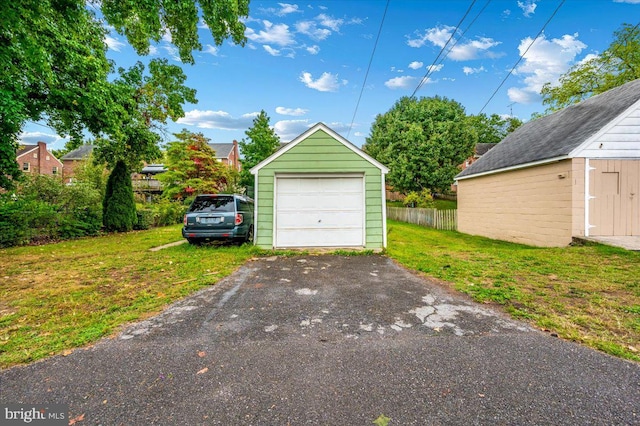 garage with a lawn