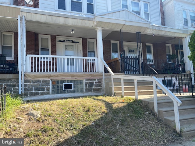 property entrance with a porch