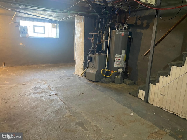 basement featuring gas water heater