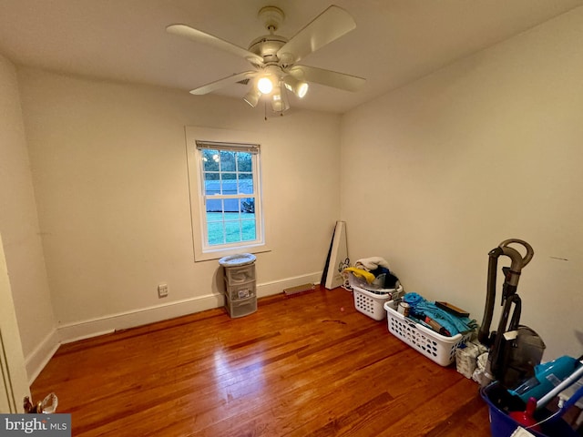 miscellaneous room featuring ceiling fan and hardwood / wood-style floors