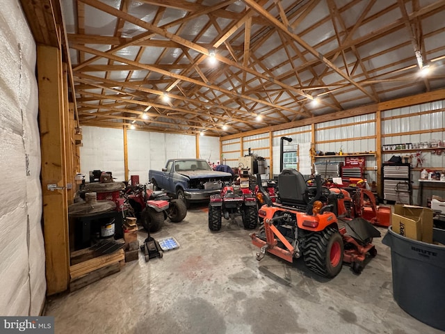 garage with a workshop area