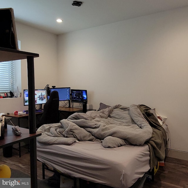 bedroom featuring dark hardwood / wood-style floors