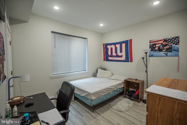 bedroom with light hardwood / wood-style flooring