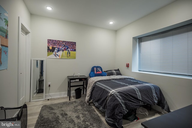 bedroom featuring light wood-type flooring