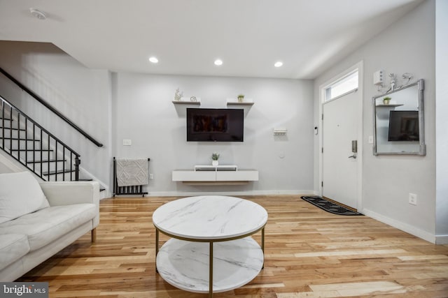 living room featuring light wood-type flooring