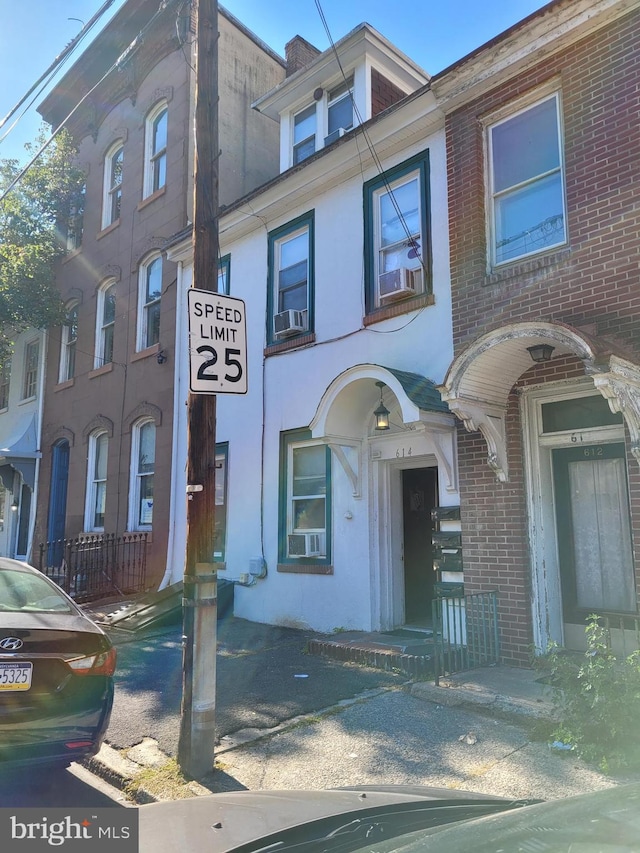 view of front of house featuring brick siding