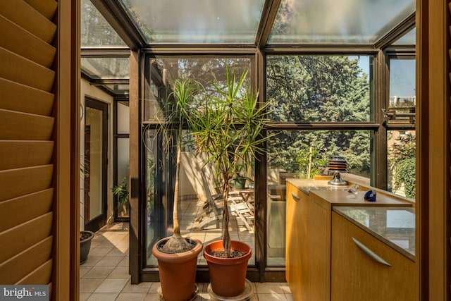 unfurnished sunroom featuring a healthy amount of sunlight