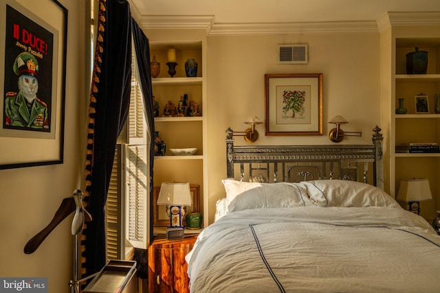 bedroom with ornamental molding