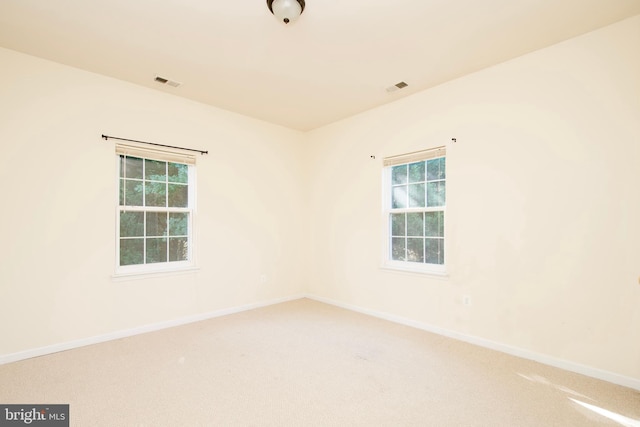 view of carpeted spare room