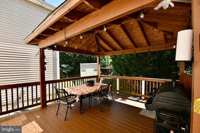 wooden deck featuring a gazebo