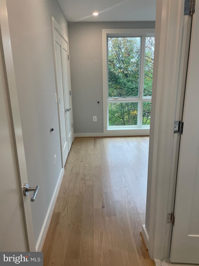 entryway with light hardwood / wood-style flooring