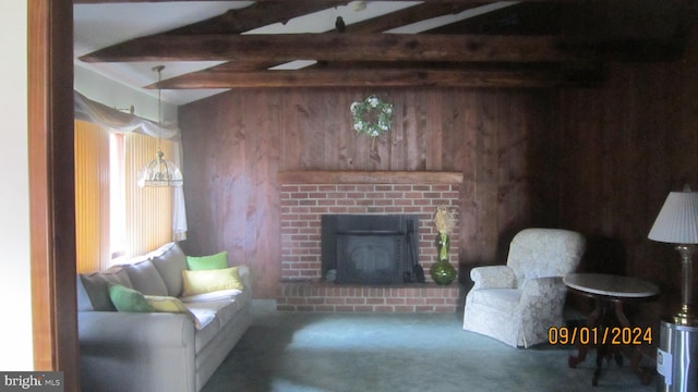 living room featuring carpet, wooden walls, beam ceiling, and a fireplace