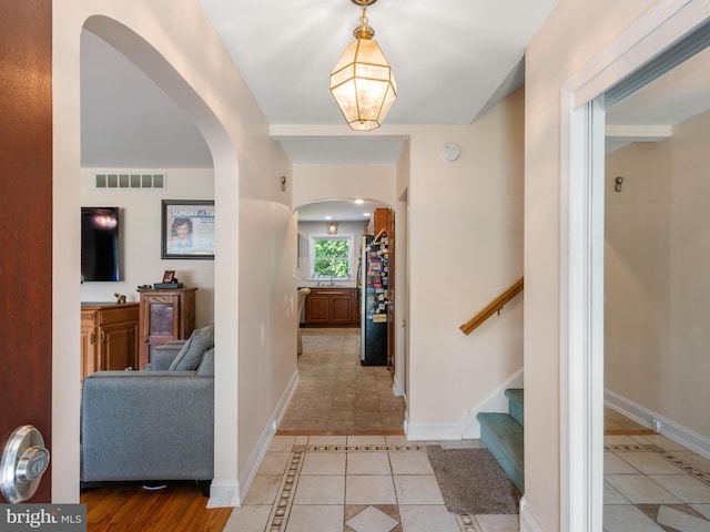 foyer entrance with light tile patterned floors