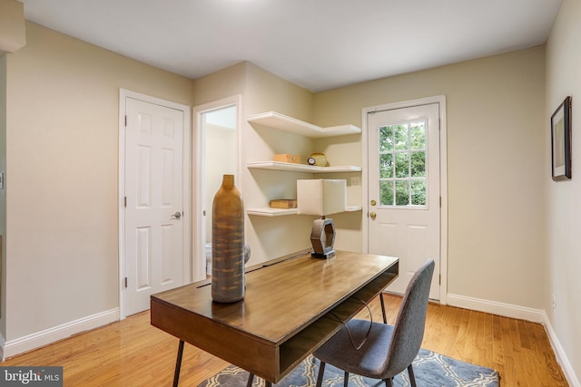 home office featuring light hardwood / wood-style floors