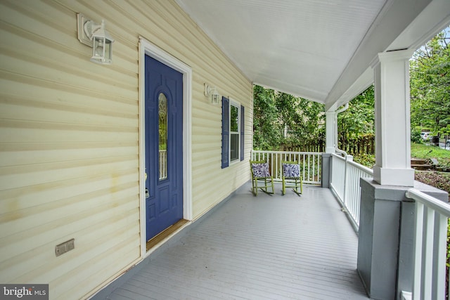 deck featuring covered porch