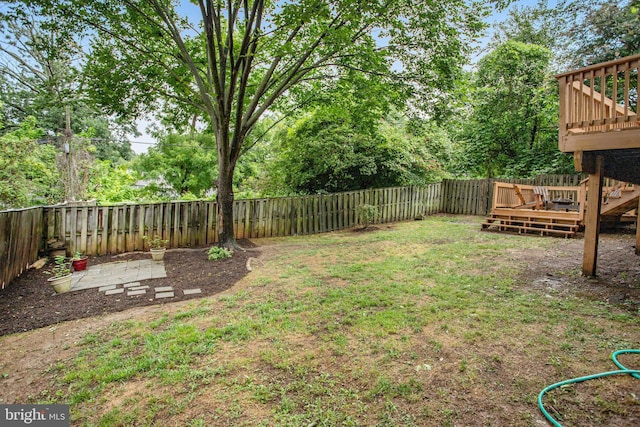 view of yard featuring a deck