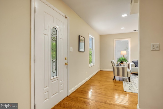 foyer with light wood-type flooring