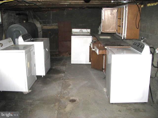 washroom with washer and dryer