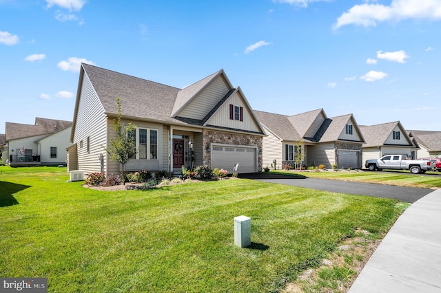 view of front of property with central AC and a front yard