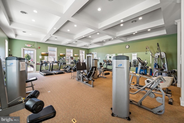 workout area featuring carpet and coffered ceiling